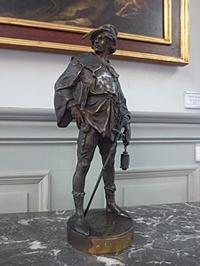 Écolier au XIVe siècle, bronze, Gray, musée Baron-Martin.