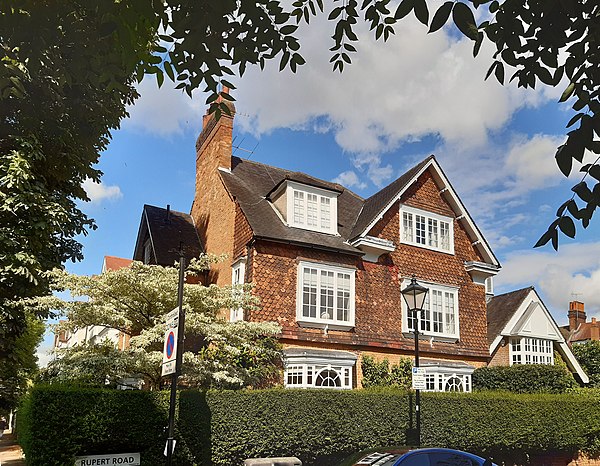 Leafy artists' suburb: a tile-hung detached house on Rupert Road, Bedford Park, by the architect Norman Shaw, 1879