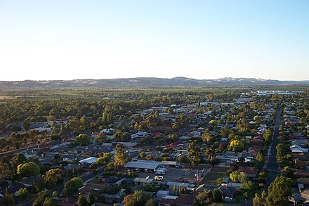 Nuriootpa, Barossa Valley. The town is in the foreground, followed by vineyards, Barossa Ranges in the background.