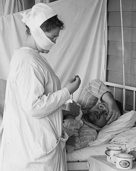 File:Nurse with mask and patient detail, 1918 at Spanish Flu Ward Walter Reed (cropped).jpg