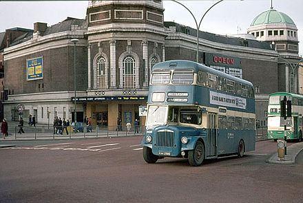 A 1977 view of the New Victoria / Gaumont as the Odeon, with two West Yorkshire PTE buses passing in front