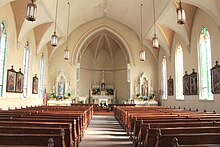 Interior of church Old Saint Patrick Catholic Church Nortfield Township Michigan Sanctuary.JPG