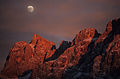 Pale di San Martino (Trentino, Italy): sunset with moon view from Passo Rolle