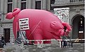 Inflatable art being used in a political protest.