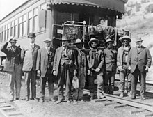 Prisoners of the Bluff War in Thompson, Utah, waiting to board a train for their trial in Salt Lake City. Polk and Posey War March 1915.jpg