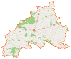 Mapa konturowa powiatu zwoleńskiego, blisko prawej krawiędzi na dole znajduje się punkt z opisem „Lucimia”