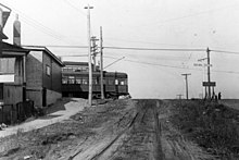 A streetcar on Kingston Road, looking south on Birchmount Road. The first transit line in Scarborough was established in 1893.