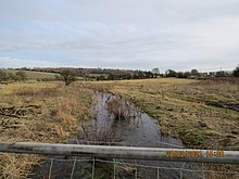 River Gade flowing full at Fourways Farm, Hemel Hempstead Road, Feb 2021 River Gade at Fourways Farm, Hemel Hempstead Road.jpg