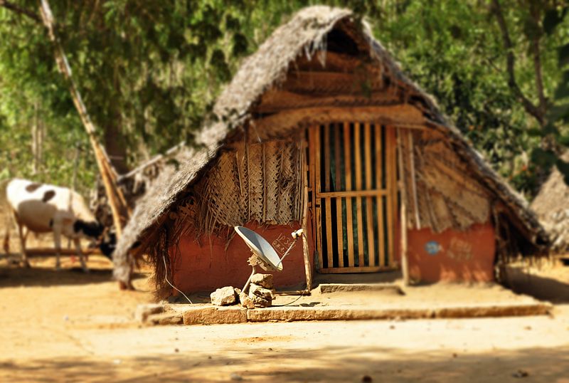 File:Satellite dish in hut.jpeg