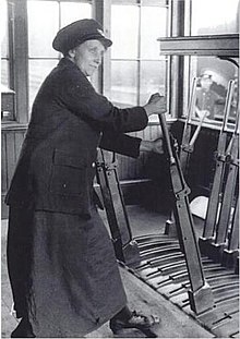 Signalwoman in a Great Central cabin at Annesley, Nottinghamshire, 1918 Signalwoman Birmingham 1918.jpg