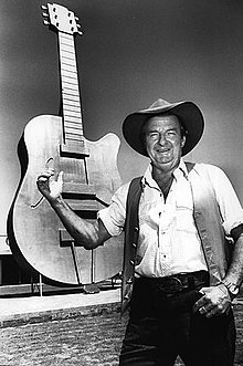 Slim Dusty, who was the best-selling domestic country artist Slim Dusty with Golden Guitar.jpeg