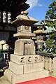 A stone lantern at the Tenmangū Shinto shrine in Kita-ku.