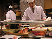 Sushi chef preparing nigirizushi, Kyoto, Japan