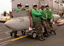 TARPS pod mounted on a skid with TARPS personnel TARPS pod on skid.jpg