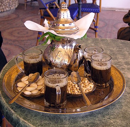 Tunisian mint tea served with nuts