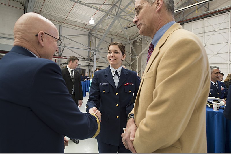 File:U.S. Coast Guard Adm. Robert J. Papp Jr., left, commandant of the Coast Guard, shakes hands with Petty Officer 3rd Class Helmly, center, during the MH-65D Dolphin helicopter 6535 memorial dedication ceremony 130301-G-VG516-285.jpg