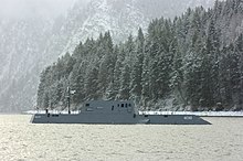 The Advanced Electric Ship Demonstrator (AESD) undergoes sea trials on Lake Pend Oreille at the Naval Surface Warfare Center