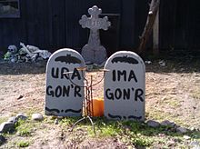 Humorous tombstones in front of a house in California Ura and ima.jpg