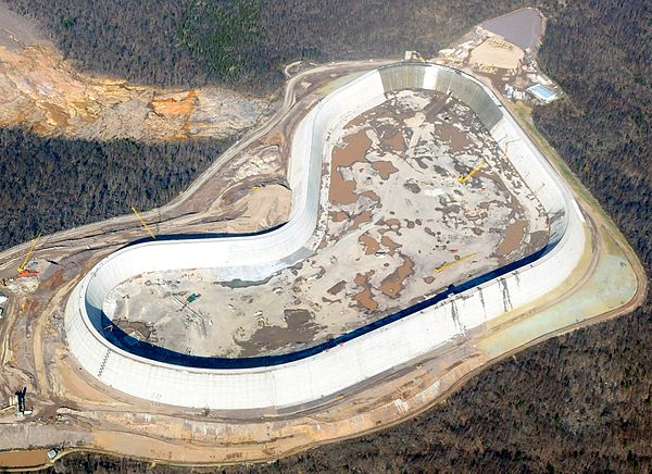 The rebuilt upper reservoir of the Taum Sauk plant, nearing completion in this photo, is the largest roller-compacted concrete dam in North America.