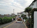 Ventnor Carnival 2011, with carnival floats seen moving through St Catherine Street.