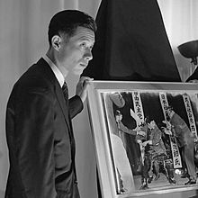 Yasushi Nagao with his Pulitzer Prize winning photo. (1961) Yasushi Nagao (1961).jpg