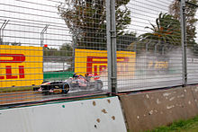 Photo de Daniel Ricciardo sous la pluie lors des qualifications du Grand Prix d'Australie