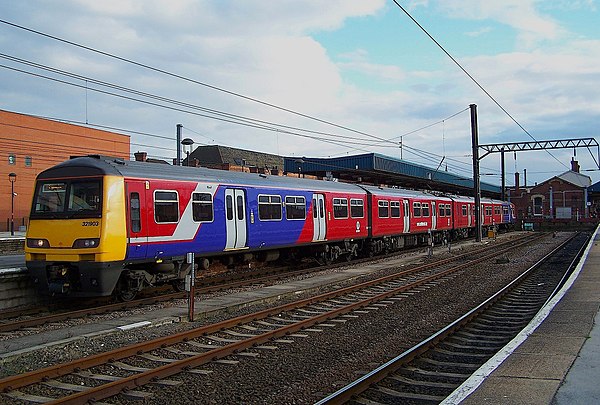 Class 321/9 in West Yorkshire Passenger Transport Executive livery at Doncaster