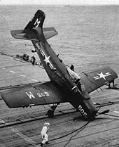 A U.S. Navy Douglas AD-4 Skyraider of Attack Squadron 65 (VA-65) "Fist of the Fleet" hits the barrier with a faulty tailhook aboard the aircraft carrier USS Yorktown (CVA-10). VA-65 was assigned to Carrier Air Group 2 (CVG-2) aboard the Yorktown for a deployment to the Western Pacific from 3 August 1953 to 3 March 1954. AD-4 of VA-65 hitting barrier on USS Yorktown (CVA-10) c1953.jpg