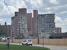 Adams Tower partially demolished in early Summer 2023. It had been standing since 1964. Adams Tower.jpg