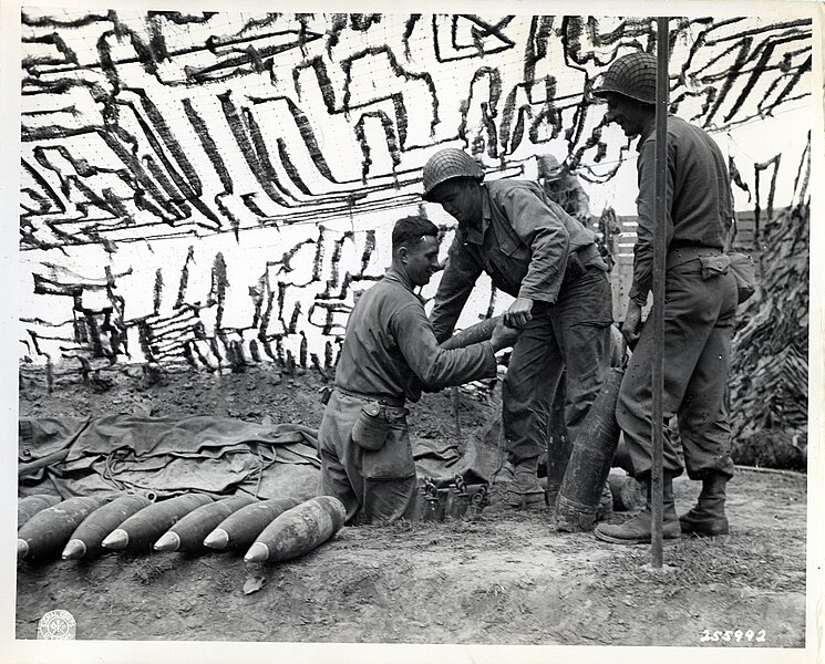 File:Artillery men pile up 155-mm ammunition.jpg