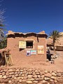 Artist living in african mud house