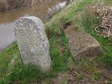 Two stones. One of 60 supplied by Robert Burchell to the Corporation of Hastings (CH), made with York stone (1859). The other marking the Bexhill Borough (BB) with 63 stones (1902).