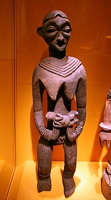 Wood Bangwa sculpture of a female figure with child, carved as a special sign of respect and honor. Bangwa female figure.jpg