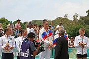 Deutsch: Beachvolleyball bei den Olympischen Jugendspielen 2018; Tag 11, 17. Oktober 2018; Mädchen, Medaillenzeremonie - Gold: Russland (Maria Woronina & Maria Botscharow), Silber: Italien (Claudia Scampoli & Nicol Bertozzi), Bronze: Norwegen (Emilie Olimstad & Frida Berntsen) English: Beach volleyball at the 2018 Summer Youth Olympics at 17 October 2018 – Girls Victory ceremony - Gold: Russia (Maria Voronina & Maria Bocharov), Silber: Italy (Claudia Scampoli & Nicol Bertozzi), Bronze: Norway (Emilie Olimstad & Frida Berntsen)