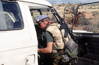 Belgian paratrooper searches a car, Somalia Belgian FNC Somalia.JPEG