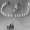 Bellamy salutes detail in 1917, from- Saluting the Flag NGM-v31-p361 (cropped).jpg
