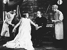 Colin Clive, Lanchester, Boris Karloff and Ernest Thesiger in Bride of Frankenstein (1935) Bride gip.jpg
