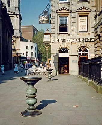 Two of the four Nails (bronze tables used for conducting business) in Corn Street