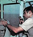 Photographs of Captain A.G.B. Grosvenor, executive officer of the USS Kitty Hawk (CV-63) from its Western Pacific Cruise Yearbook of 1970–1971, page 12.