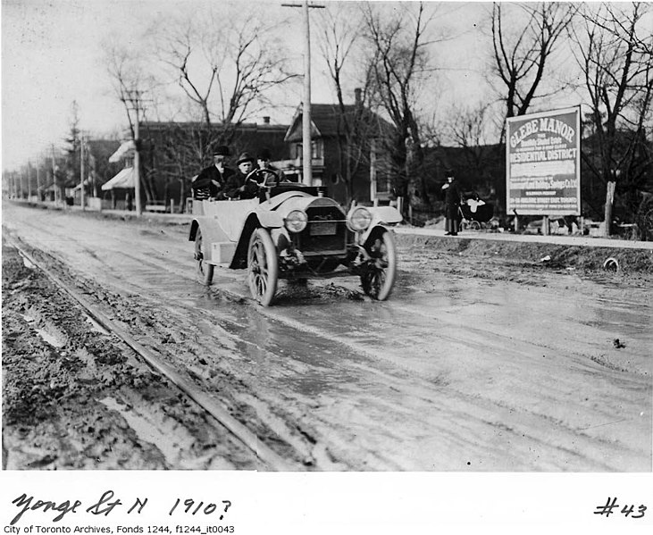 File:Car on muddy Yonge Street north (4624214617).jpg