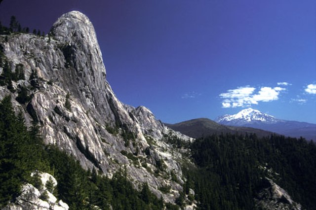 Castle Dome, a popular trail destination at Castle Crags (left foreground). Mount Shasta can also be seen (distant right).