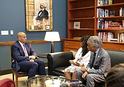 Gwen Carr and Al Sharpton meeting with Cory Booker in 2019