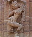 Sculpture of a dancer in the precincts of the temple