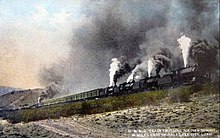 Depiction of a Denver and Rio Grande Western train climbing the summit, circa 1915. There are 5 locomotives used--four at the front and one at the back. Denver and Rio Grande train at Soldier Summit 1915.JPG