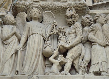Nadangel Mihael in Satan med Poslednjo sodbo tehtata duše (osrednji portal, zahodna fasada)