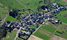 Aerial view from the northeast with the old manor (left)