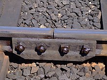 A fishplate joins two lengths of track. Fishplate UK 2006.jpg