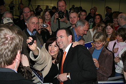 Huckabee with a supporter at a campaign rally in Wisconsin
