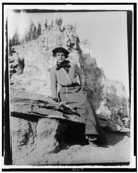 File:Frances Benjamin Johnston, full-length portrait, seated on rock in Yellowstone National Park, facing front LCCN98506430.tif