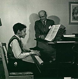 Alberto Guerrero (standing) with Glenn Gould, his most famous student, circa 1945. (Image and Text: Image Archives Canada).